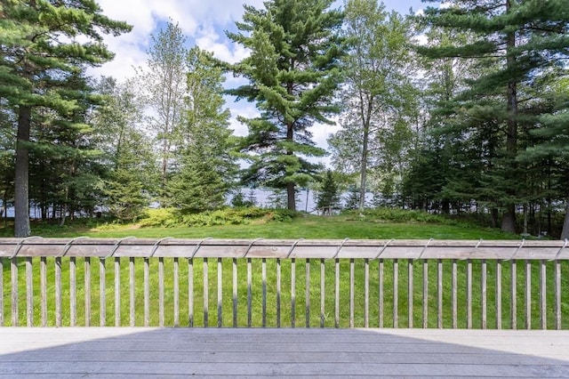 wooden deck with a yard