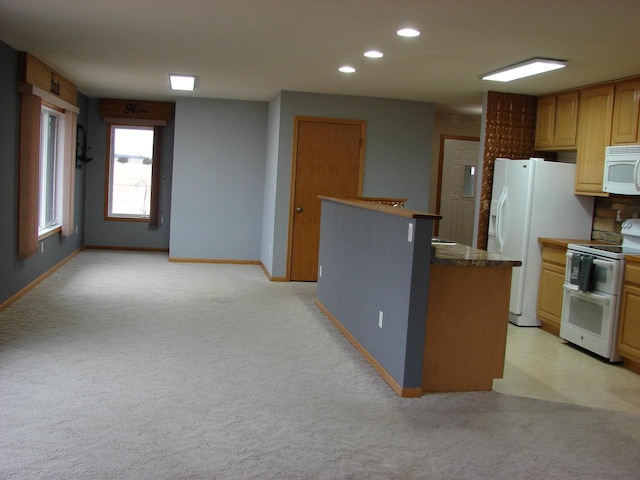 kitchen featuring light carpet, white appliances, baseboards, and recessed lighting