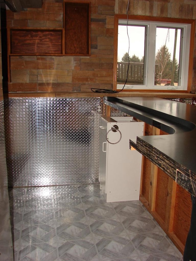 kitchen with dark countertops