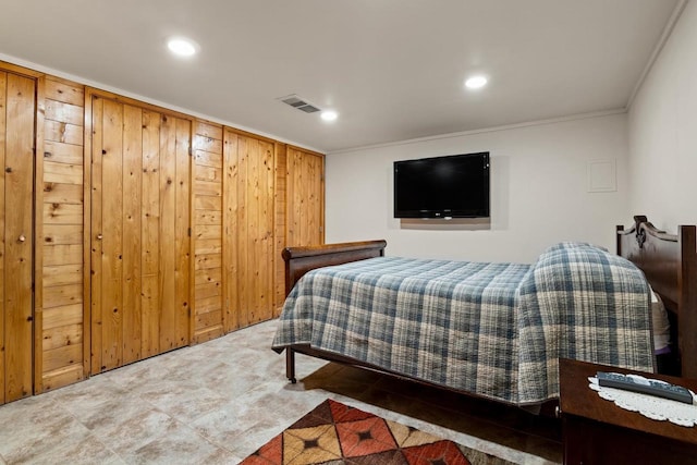 bedroom featuring recessed lighting, visible vents, and crown molding