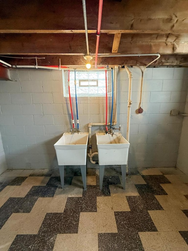 utility room featuring a sink