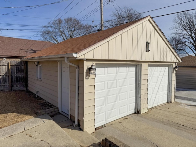 detached garage with fence