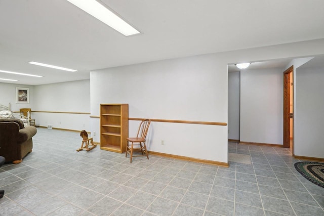 sitting room featuring baseboards