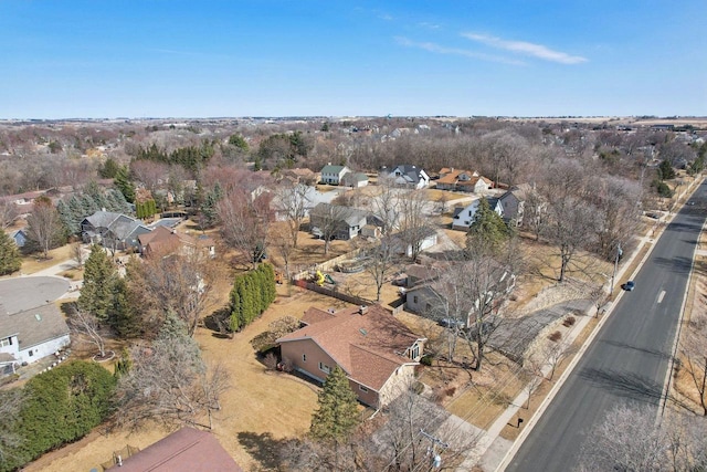 birds eye view of property with a residential view