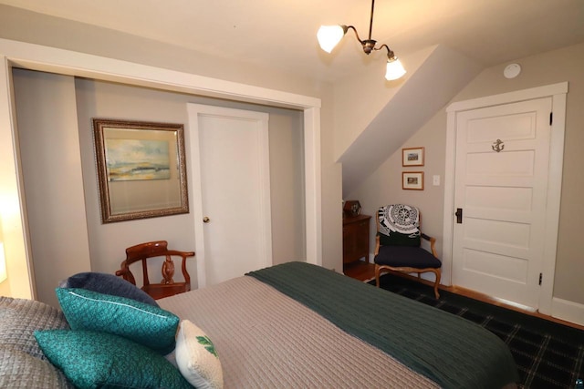 bedroom featuring a chandelier