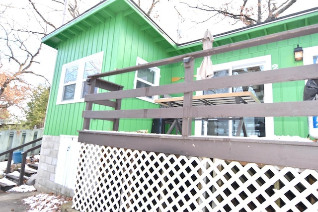 view of home's exterior with fence