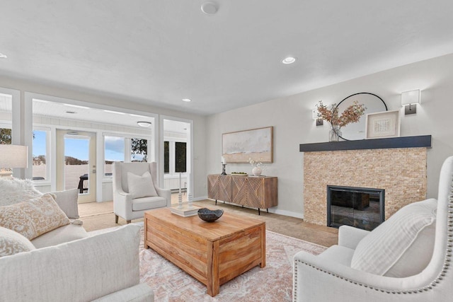 704 Fromm Ln, Elkhart Lake, WI 53020 - living room with a fireplace with flush hearth, recessed lighting, and baseboards