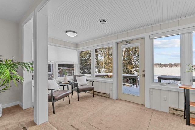 704 Fromm Ln, Elkhart Lake, WI 53020 - sunroom featuring plenty of natural light and carpet flooring