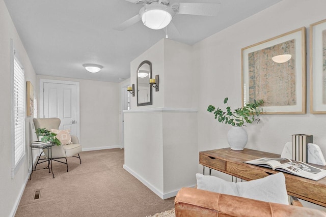 704 Fromm Ln, Elkhart Lake, WI 53020 - sitting room featuring light colored carpet, baseboards, and a ceiling fan