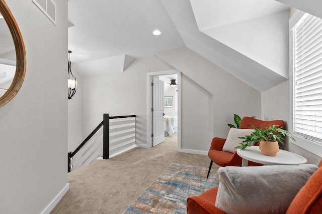 704 Fromm Ln, Elkhart Lake, WI 53020 - living area with an upstairs landing, carpet, lofted ceiling, baseboards, and recessed lighting