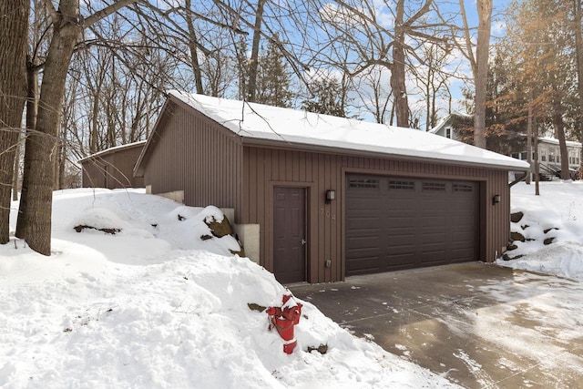 704 Fromm Ln, Elkhart Lake, WI 53020 - view of snow covered garage