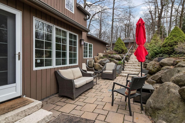 704 Fromm Ln, Elkhart Lake, WI 53020 - view of patio with an outdoor hangout area and stairs