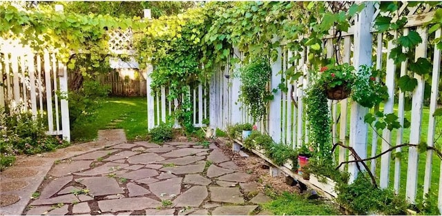 view of yard with a patio and fence