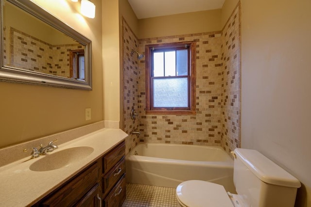 full bath with toilet, tile patterned floors, and vanity