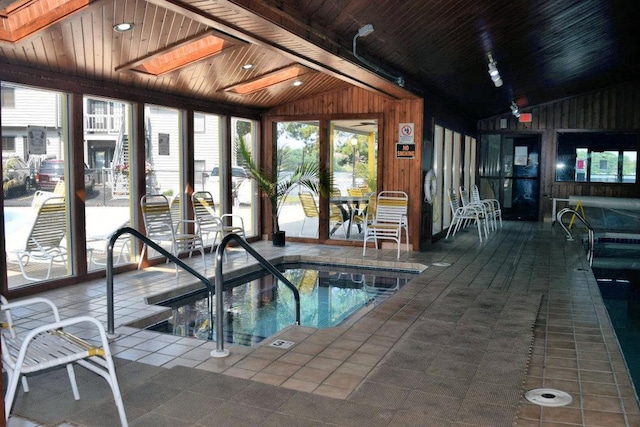 view of pool with an indoor in ground hot tub