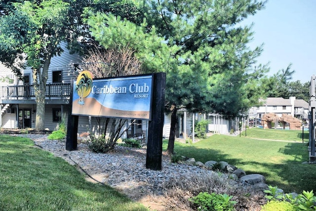 community sign with a yard