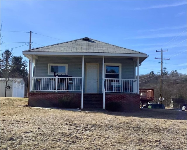 view of front of home featuring covered porch