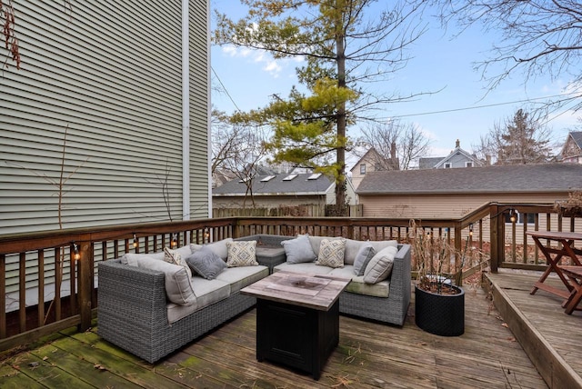 wooden deck featuring an outdoor living space