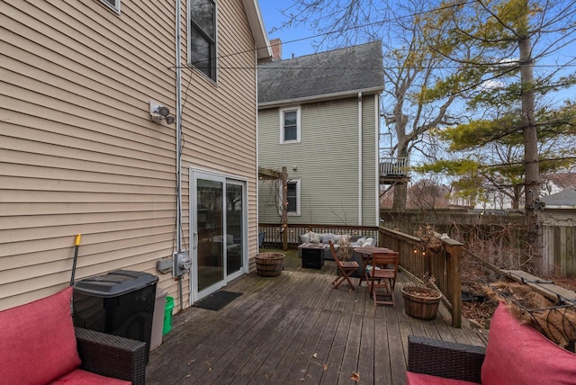 deck featuring outdoor lounge area