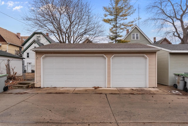 detached garage with fence