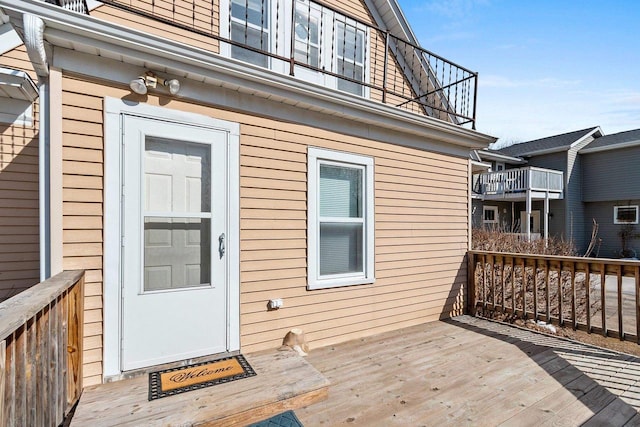 doorway to property with a deck