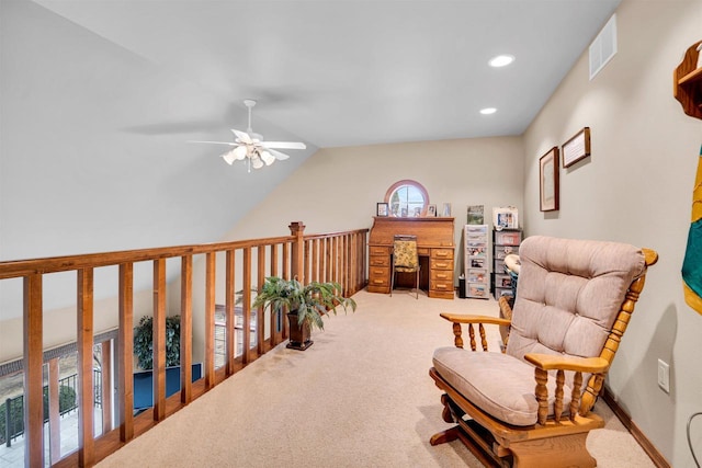 sitting room with visible vents, vaulted ceiling, carpet flooring, and recessed lighting