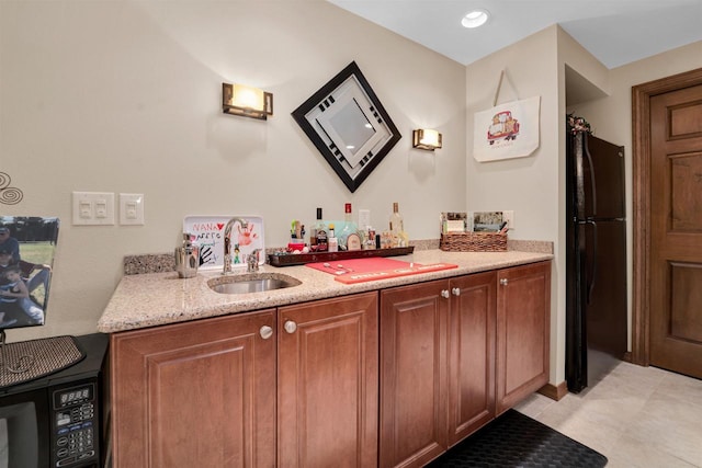 full bathroom with a sink