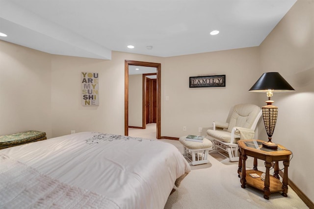 bedroom with recessed lighting, light carpet, and baseboards