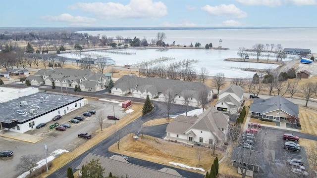 aerial view with a water view and a residential view