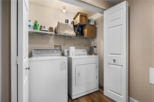 clothes washing area with laundry area, dark wood-style flooring, and independent washer and dryer