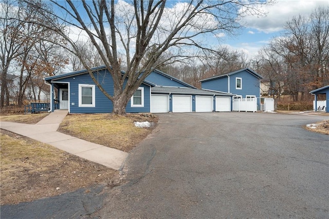 view of front of house featuring driveway and an attached garage