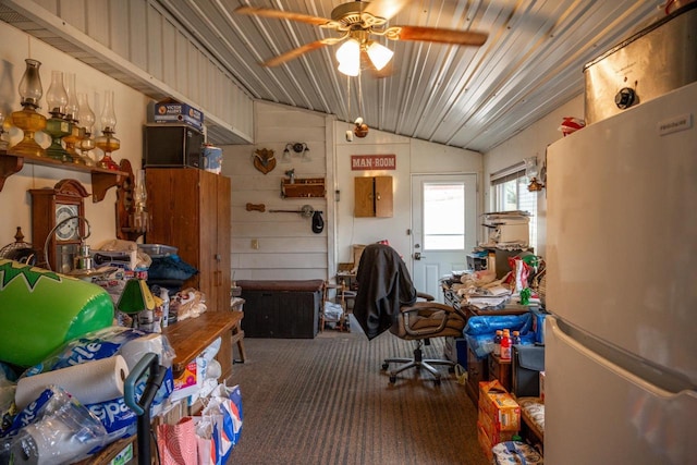 miscellaneous room with a ceiling fan, carpet, and vaulted ceiling