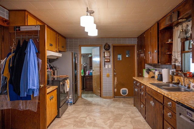 kitchen with light countertops, electric range oven, a sink, dishwasher, and under cabinet range hood