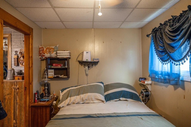 bedroom with a drop ceiling