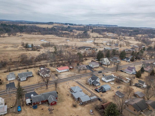 birds eye view of property featuring a rural view