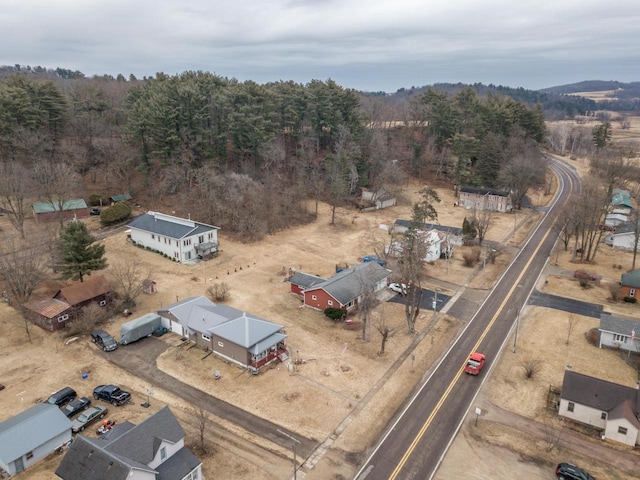 bird's eye view featuring a view of trees