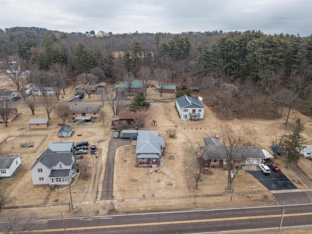 bird's eye view featuring a view of trees