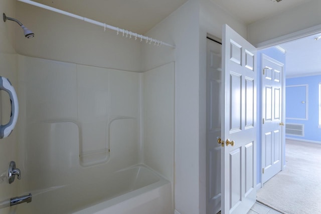 bathroom with shower / bath combination and visible vents