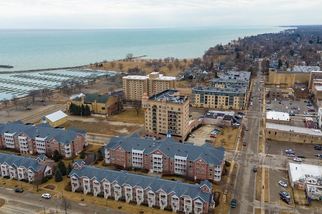 aerial view featuring a water view and a city view