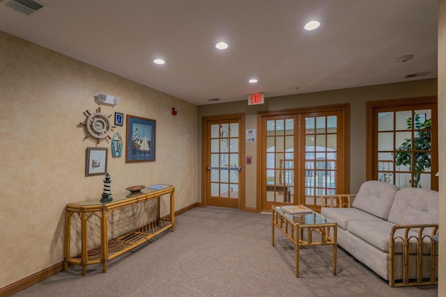 living area with baseboards, visible vents, carpet, french doors, and recessed lighting