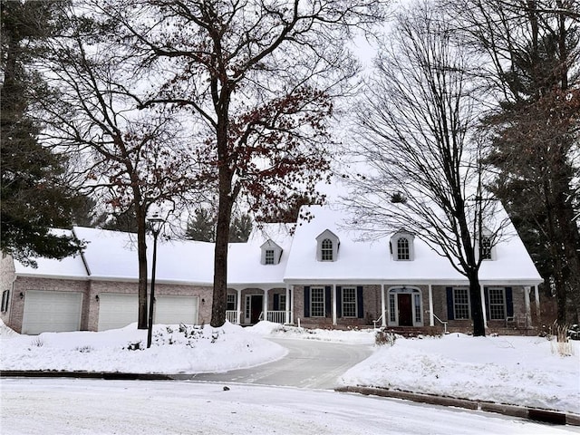 cape cod house with brick siding