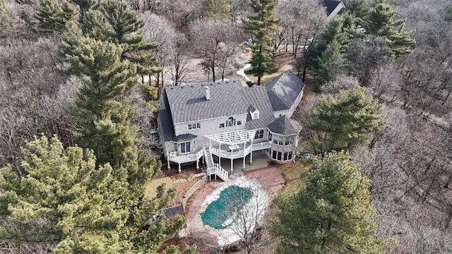 aerial view featuring a view of trees