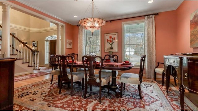 dining area featuring stairs, recessed lighting, wood finished floors, and ornamental molding