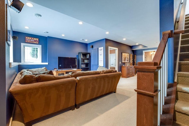 living room featuring stairs, carpet floors, and recessed lighting