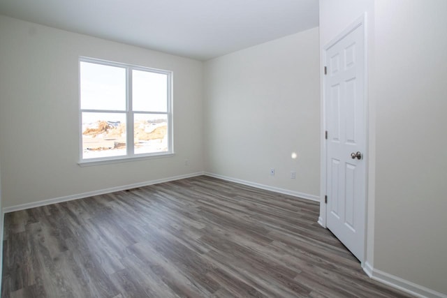 412 Kensington Ct Unit Lt142Grant, Williams Bay, WI 53191 - spare room with dark wood-style floors and baseboards