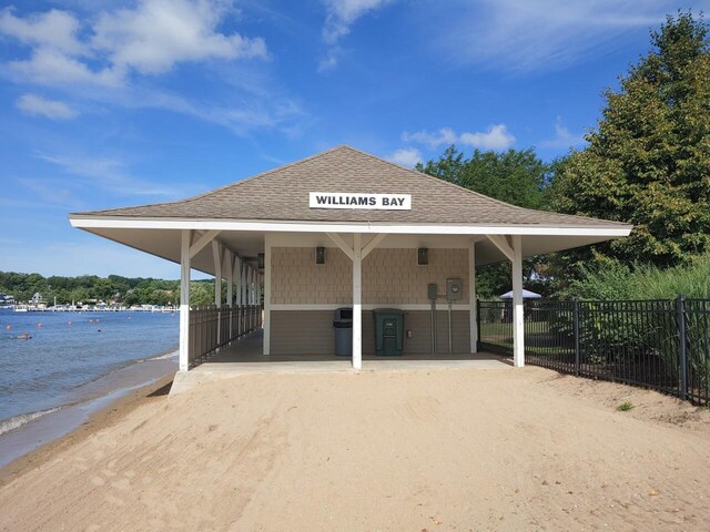 412 Kensington Ct Unit Lt142Grant, Williams Bay, WI 53191 - exterior space with a carport, a water view, and fence