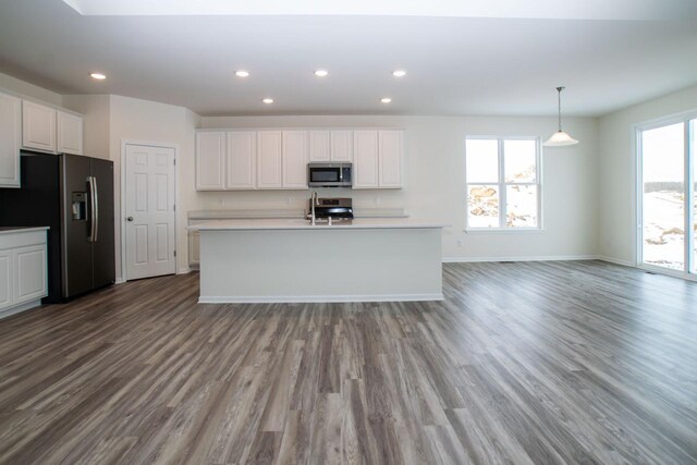 412 Kensington Ct Unit Lt142Grant, Williams Bay, WI 53191 - kitchen featuring stainless steel appliances, recessed lighting, white cabinetry, and wood finished floors