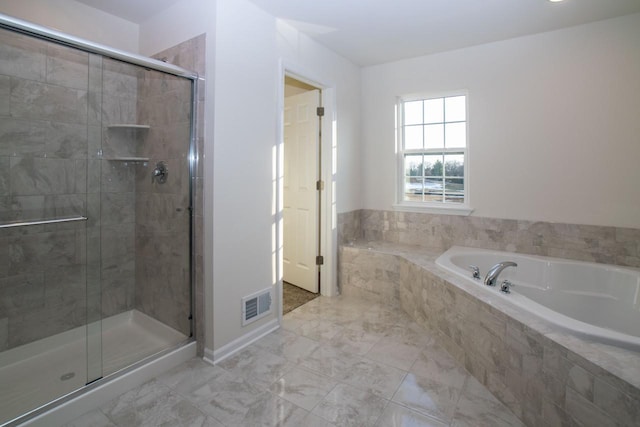 full bathroom with a garden tub, a shower stall, and visible vents