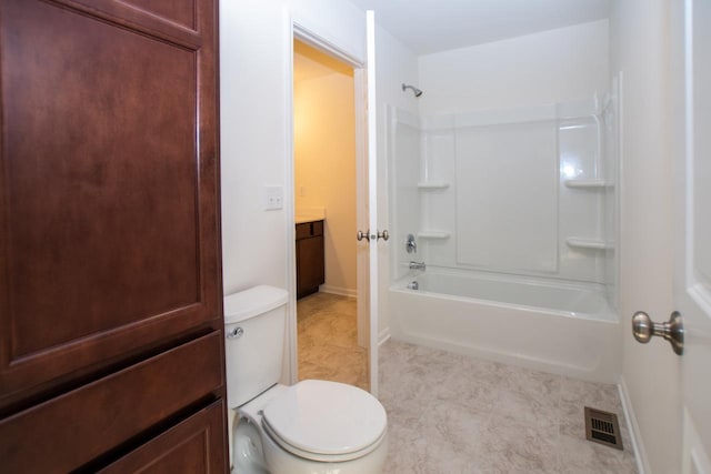 full bathroom featuring toilet, vanity, visible vents, baseboards, and washtub / shower combination