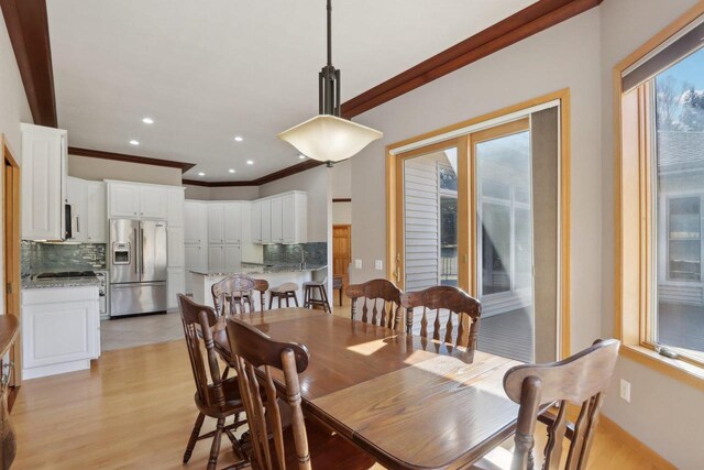 4707 Plainfield Ct, Middleton, WI 53562 - dining space featuring light wood-style floors, ornamental molding, and recessed lighting